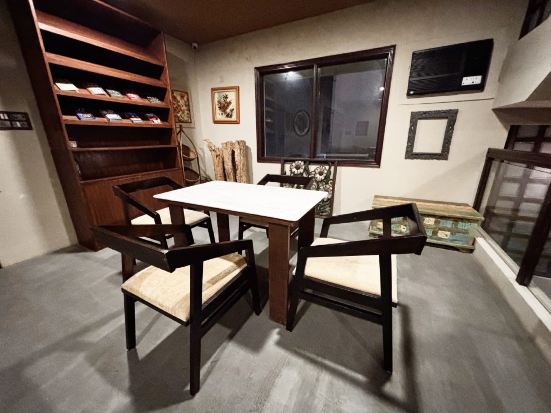 Angled perspective of conversation table and comfortable modern chairs